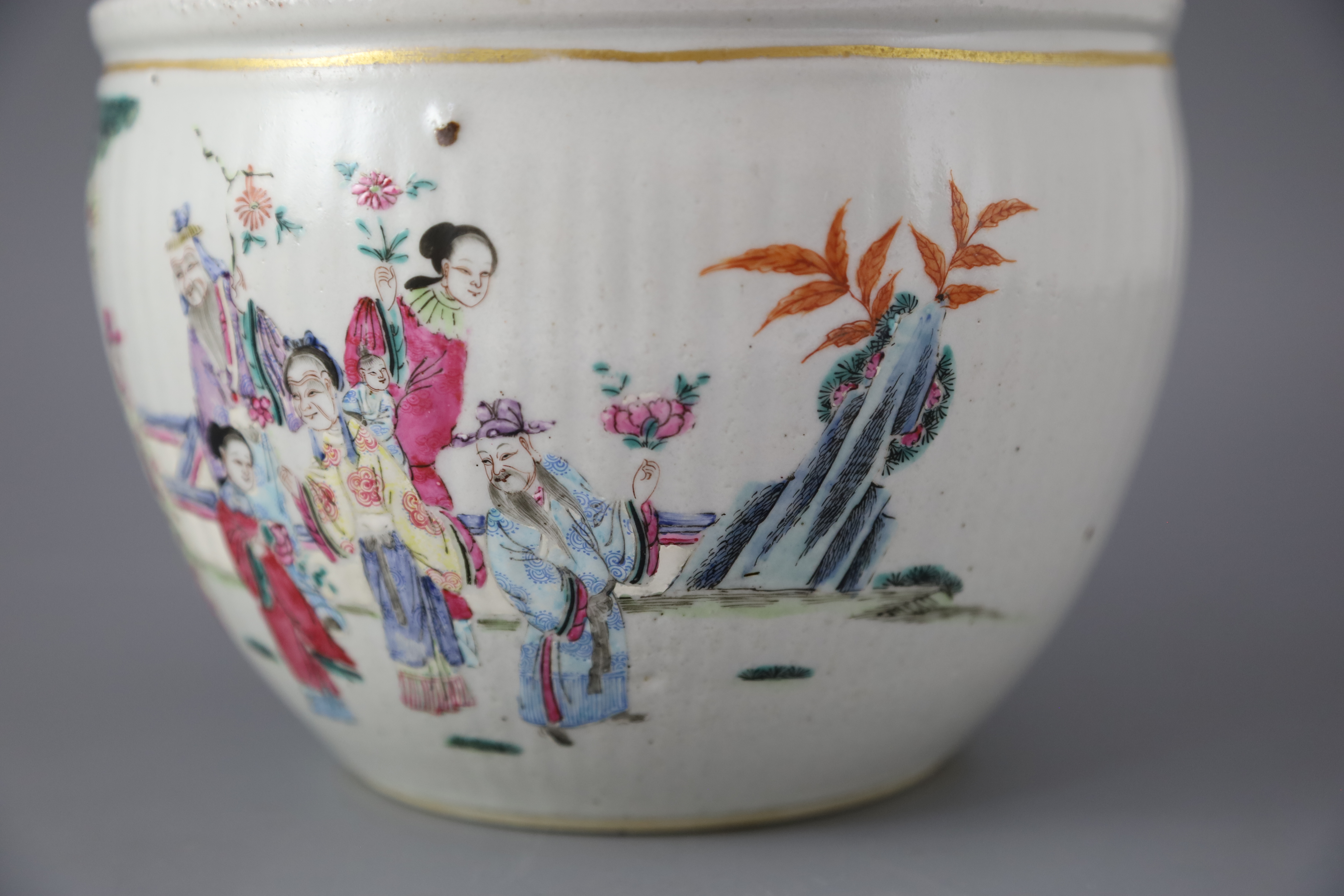 A Chinese famille rose immortals jardiniere, 19th century, 22cm diameter